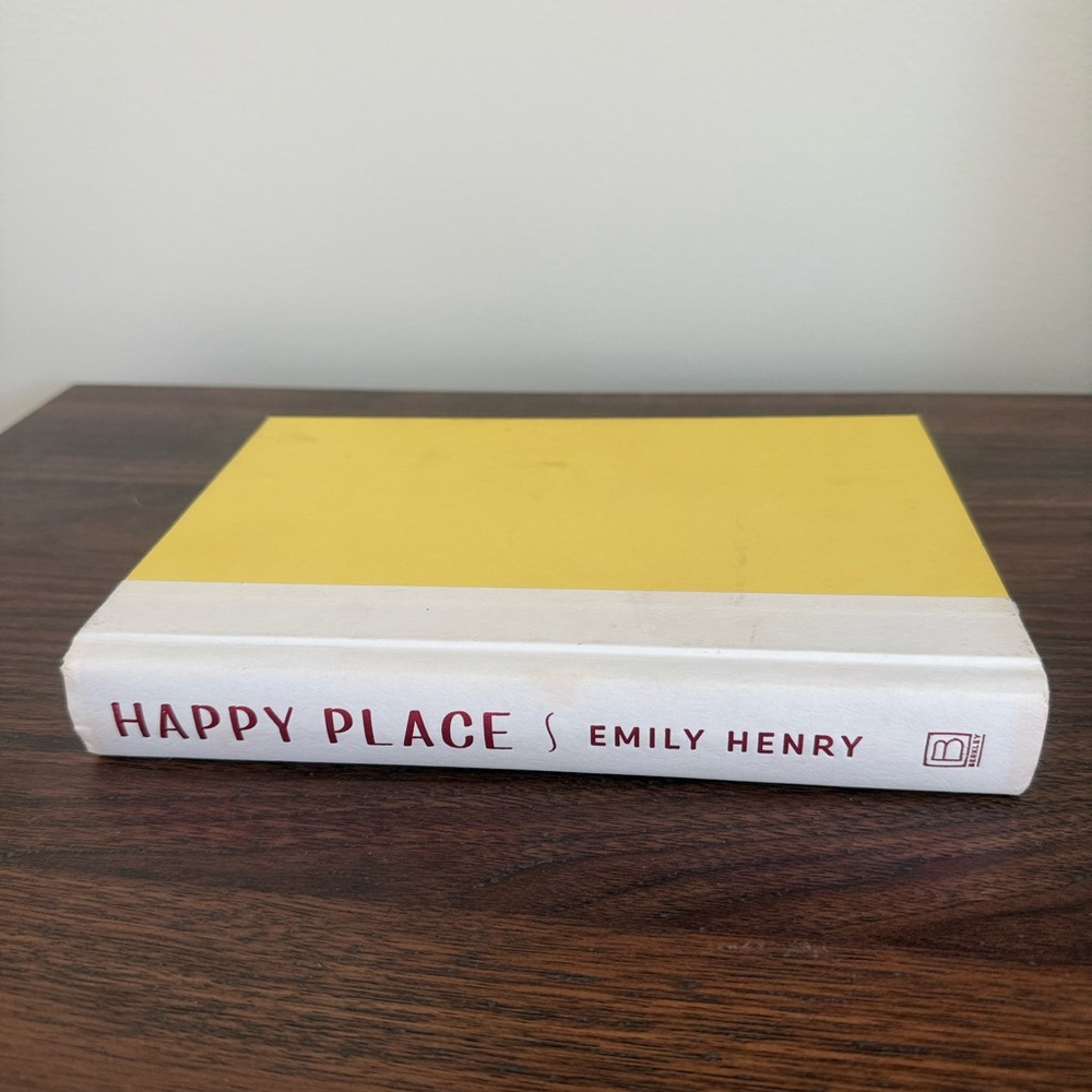 Yellow and White Book 'Happy Place' by Emily Henry